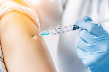 close up doctor holding syringe and using cotton before make injection to patient