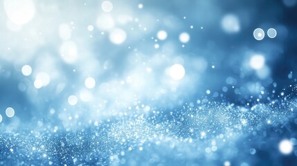 Beautiful holiday-themed abstract light blue background with soft glowing sparkles and frosty details, perfect for seasonal designs