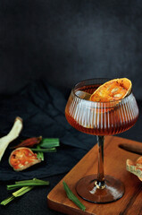 A Glass of Bael Fruit Juice Serve on Wooden Board