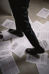 businessman reading newspaper walk to paper 