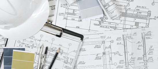 architect design working drawing sketch plans blueprints and making architectural construction model in architect studio,flat lay