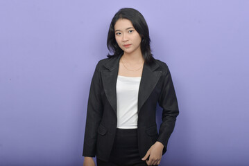 Asian Business Woman Wearing a Black Suit