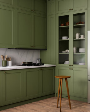 A modern green kitchen featuring a sleek design with beautiful natural wood accents