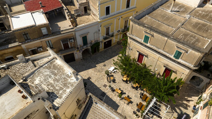 Fototapeta premium Aerial view of a square in the historic center of Grottaglie. It is a town in the province of Taranto in Puglia, Italy.