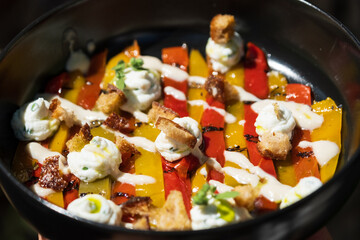 Grilled bell peppers with creamy cheese and crispy croutons, ideal for healthy meals, vegetarian...
