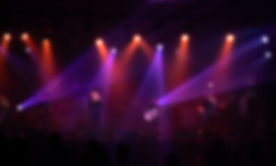 Blur image of red stage lights background.