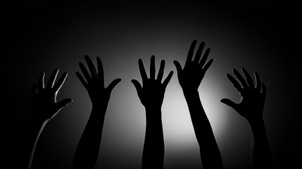 Obraz premium Silhouette hands raised at a music festival black color only