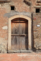 Old Wooden Barn Door in Italian Rural Village