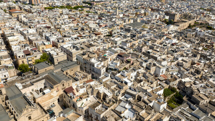 Aerial view of houses, apartments and buildings in the historic center of Grottaglie. It is a city in the province of Taranto, in Puglia, Italy.