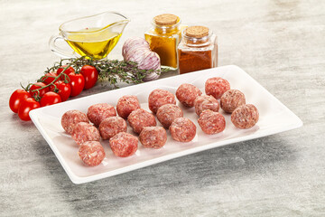 Uncooked raw beef meatball minced