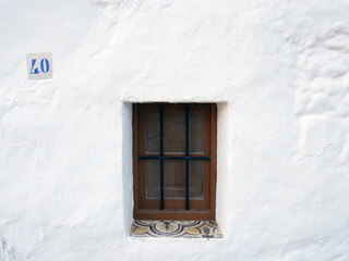 A typical spanish white washed wall window village, Andalusia, Spain.