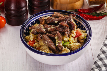 Traditional couscous with beef and vegetables