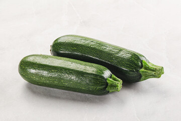 Raw green ripe zucchini vegetable