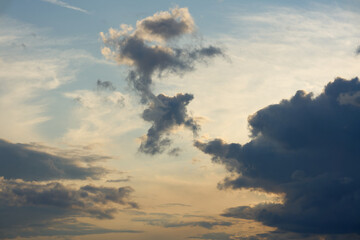 Dramatic sky with storm clouds before rain. Panoramic view of the stormy sky and dark clouds. Concept on the theme of weather, natural disasters, funny clouds. High quality photo
