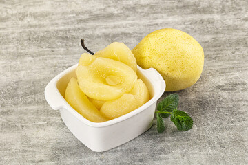Canned yellow pear with syrup