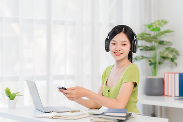 Obraz premium Smiling Woman Working From Home 