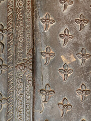 Detail close up of a thai sculpture pattern made of metallic iron