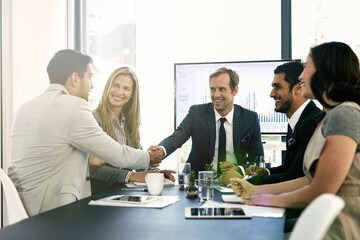 Smile, business people and handshake in meeting for agreement, b2b partnership or investment deal. Happy group, collaboration or shaking hands for acquisition, sponsorship or financial data in office