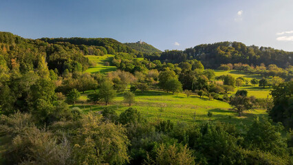 A flight above Dettingen Teck towards the Castle Teck which is located high above the mountain 