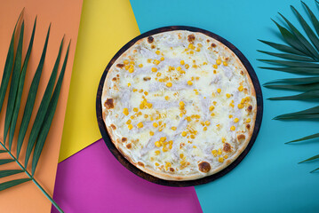 Kids' Chicken and Corn Pizza on a Colorful Tropical Background