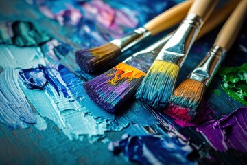 Fototapeta premium Brightly colored paints and paintbrushes await use on a canvas, showcasing bold, abstract brushstrokes and creativity. Generative AI