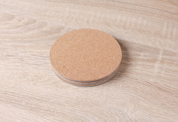 Cork coasters for drinks on a wooden table
