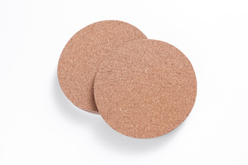 Cork coasters for drinks on a white background