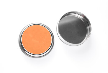 Empty Film reel tin box on white background