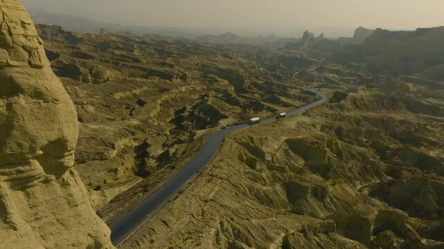 Cinematic drone shot of road and mountain in buzi pass top Makran coastal Highway Balochistan