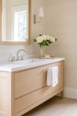 Stylish bathroom interior featuring a modern vanity and vibrant floral arrangement