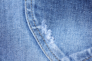Naklejka premium Texture of blue jeans, back pocket