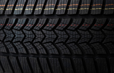 Close-up View of New Winter Tire Tread Pattern – High-Performance Rubber Texture