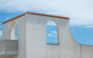 white windows and blue sky