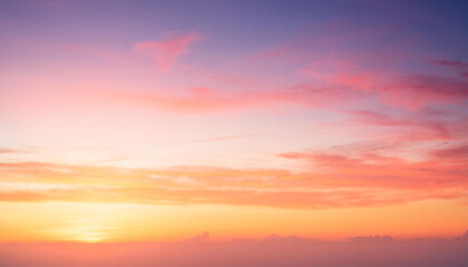 Colorful sunset sky in the morning with Yellow, Orange and pink sunrise sky with romantic sweet golden hour horizon sunshine summer background