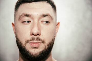 Fototapeta premium An attractive man and his health problems. Depression and despair.