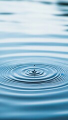 A close-up of ripples in water, creating a serene and tranquil atmosphere, ideal for relaxation and calm.