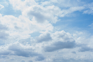 Fototapeta premium Blue Sky with Fluffy White Clouds on a Sunny Day