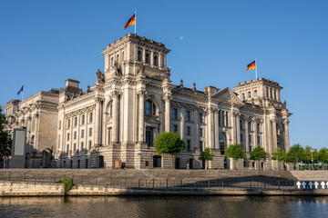 The historic Reichstag at the river Spree in Berlin on a sunny day