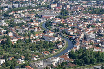 Nancy, France - September 21th 2024 : View Nancy metropolis seen from the 16th floor of the Panoramic Tower with the Marne-Rhine canal winding through the middle of the city.
