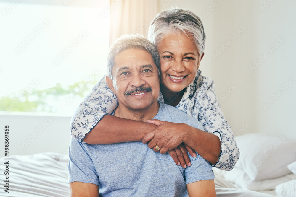 Canvas Prints Portrait, bedroom and old couple with smile, hug and bonding together with anniversary, care and home. Face, senior man and mature woman with embrace, marriage and relationship with love and holiday