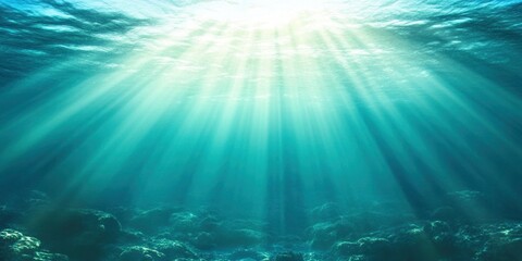Fototapeta premium shining light rays under water of blue ocean background