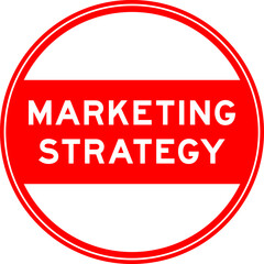 Red color round seal sticker in word marketing strategy on white background