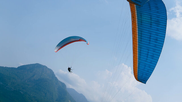 Skydiving from Paralayang Gunung Banyak Hills, Batu, Malang, East Java. Paragliding over the beautiful view.
