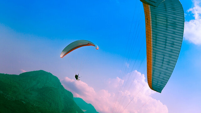 Skydiving from Paralayang Gunung Banyak Hills, Batu, Malang, East Java. Paragliding over the beautiful view.