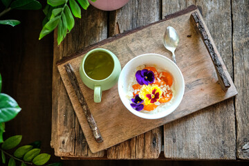 cottage cheese with apricot jam, cream and edible flowers