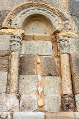 Fototapeta premium Windows of the apse of the 13th century hermitage of San Cristobal in the town of Sotresgudo. Burgos, Castile and Leon, Spain.