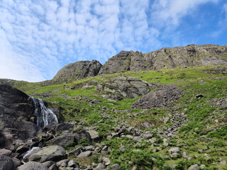 Rocks, hills and waterfall in Ireland, natural landscape background