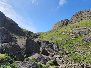 Rocks, hills and waterfall in Ireland, natural landscape background