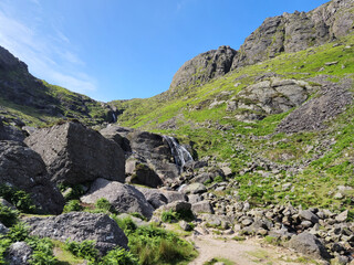 Rocks, hills and waterfall in Ireland, natural landscape background