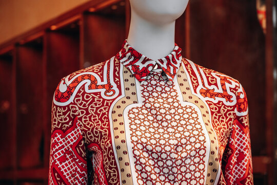 Nice, France - July 27th, 2024: Close-up of a women's Hermes blouse in a boutique window in Nice